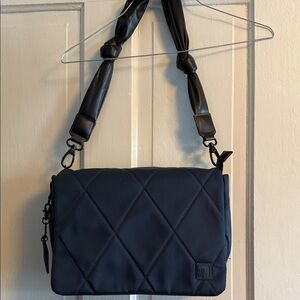 IHKWIP navy blue nylon bag. Excellent preowned condition no flaws.